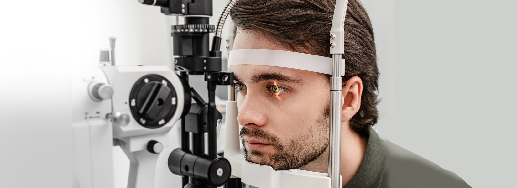 young man during eye exam in Frederick Research Park